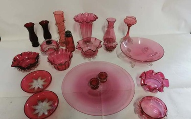 A collection of Victorian and later cranberry glass items, to...