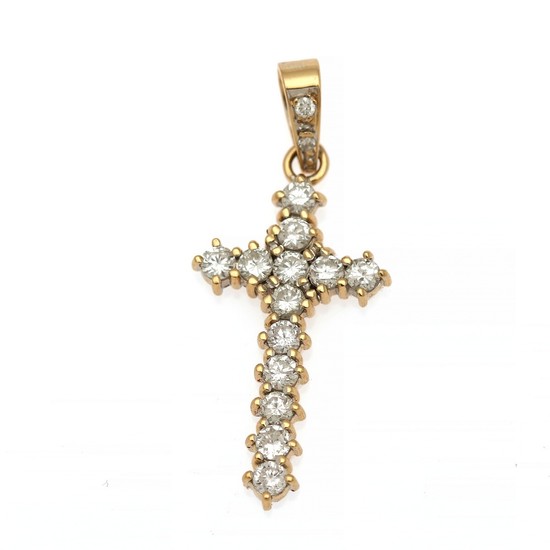 A diamond pendant in the shape of a cross set with numerous brilliant-cut diamonds totalling app. 0.91 ct., mounted in 18k gold. 3.5×1.5 cm.