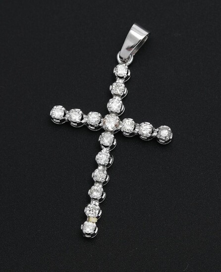 SOLD. A diamond pendant in the shape of a cross set with numerous diamonds weighing a total of app. 0.60 ct., mounted in 18k white gold. – Bruun Rasmussen Auctioneers of Fine Art