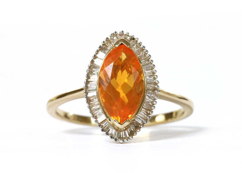 A gold fire opal and diamond cluster ring