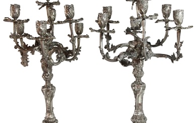 A good pair of German silver seven branch candelabrum with s...