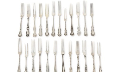 A group of sterling silver berry forks