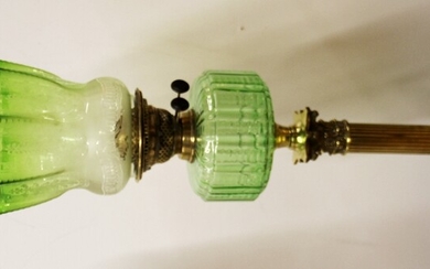 A large antique brass Corinthian column banqueting oil lamp with green glass fount and etched green glass shade, overall H. 78cm.