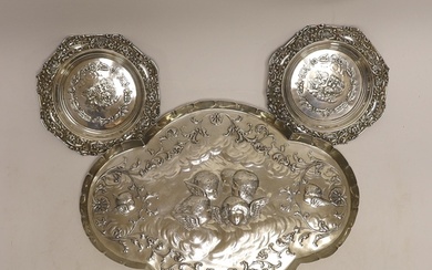 A late Victorian repousse silver dressing table tray with Re...