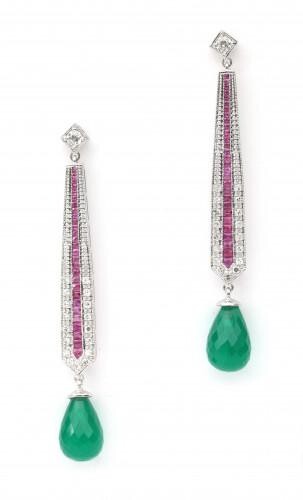 A pair of 14 karat white gold diamond, ruby and agate earrings. Long pair of earrings of tapered design, set with diamonds, carré cut rubies and a briolette cut green agate suspending. One brilliant cut diamond of ca. 0.10 ct., ca. F-G, ca. VS is set...