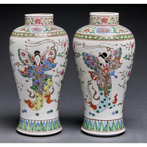 A pair of Chinese famille rose vases, decorated with butter...