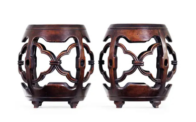 A pair of Chinese hongmu barrel form stools Late Qing dynasty With...