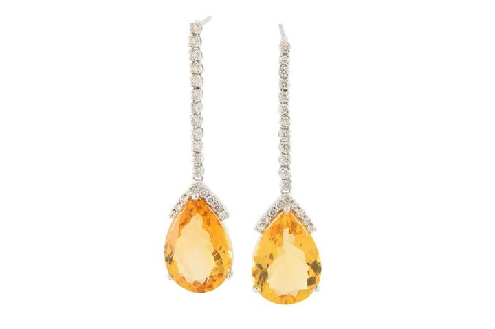 A pair of citrine and diamond earrings
