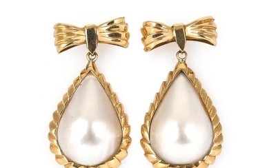 A pair of pearl ear pendants each set with a cultured fresh...