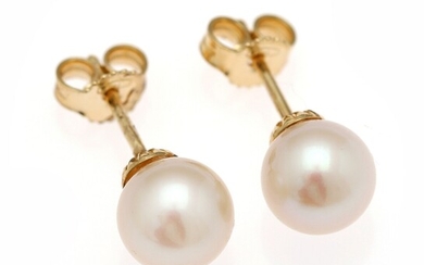SOLD. A pair of pearl ear studs each set with a cultured pearl, mounted in...