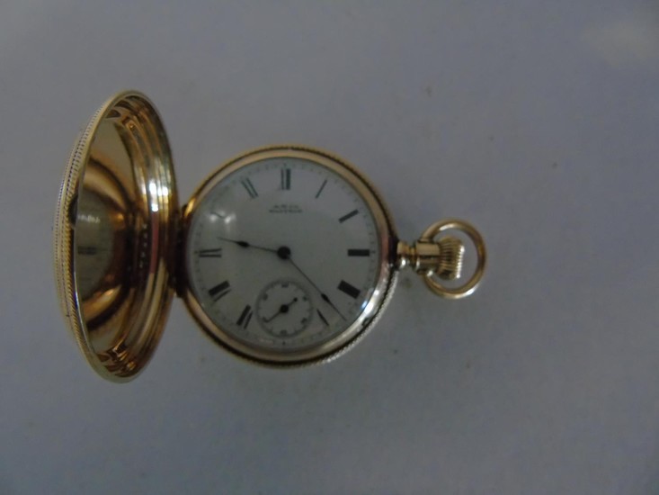 A quality engraved 14ct gold A.W. Co Waltham pocket watch in...