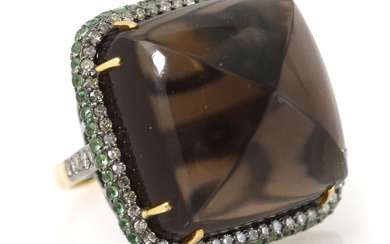 A ring set with a fancy-cut smoky quartz weighing app. 54.84 ct....