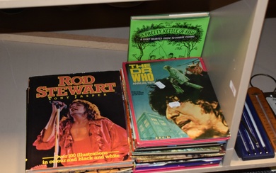 A selection of vintage teenage annuals including Doctor Who, Rod Stewart and Paul McCartney and