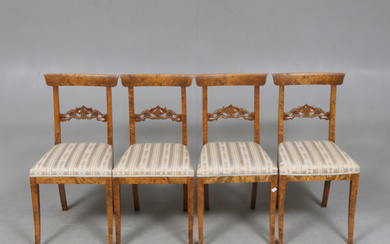 A set of four late empire-style chairs, circa 1900.