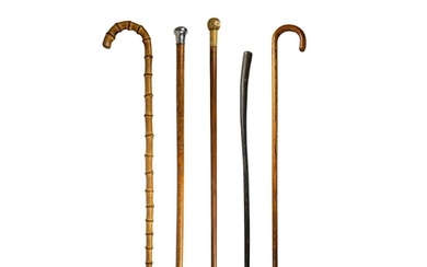 A silver topped malacca walking cane. Length 89.5cm, togethe...