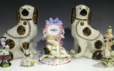 A small group of late 19th century and later ceramics, including a figural pocket watch holder, mode