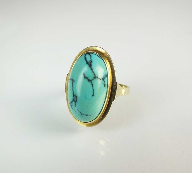 A turquoise dress ring