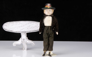 A unusual 19th century papier-mâché boy doll with moulded hat