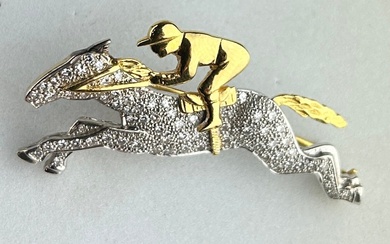 AN 18CT GOLD AND DIAMOND HORSE AND JOCKEY BROOCH