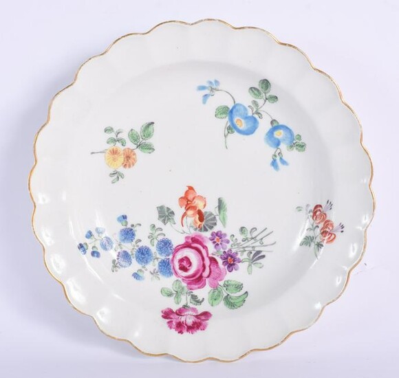 AN 18TH CENTURY WORCESTER SCALLOPED PLATE painted with