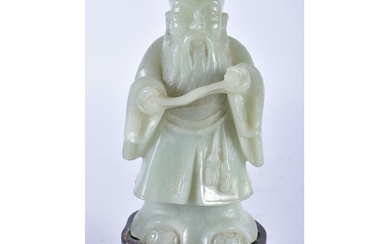 AN EARLY 20TH CENTURY CHINESE CARVED GREEN JADE FIGURE OF AN...