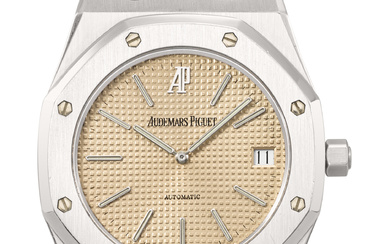 AUDEMARS PIGUET. A RARE AND HIGHLY ATTRACTIVE STAINLESS STEEL AUTOMATIC...