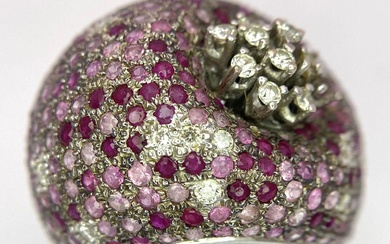 An 18K White Gold Diamond and Ruby Dress Ring....