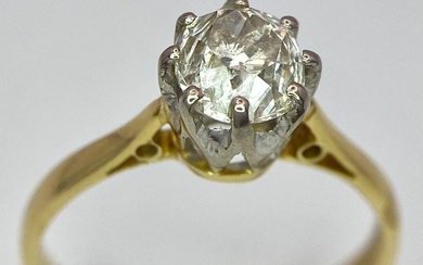 An 18K Yellow Gold Diamond Solitaire Ring. 1ct brilliant...