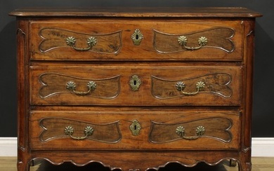 An 18th century French Provincial chestnut serpentine commod...