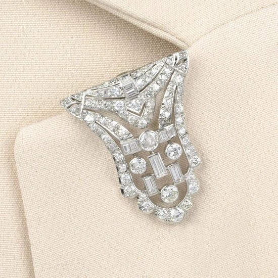 An Art Deco brilliant and baguette-cut diamond