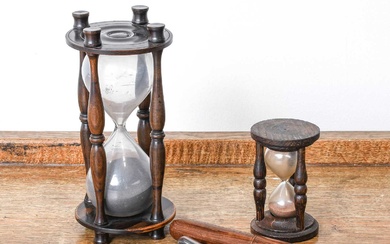 An Hourglass Sermon Timer, 19th century, in lignum vitae frame...