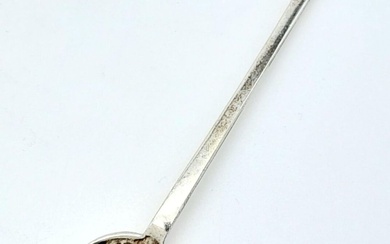 An antique sterling silver commemorative spoon with full...