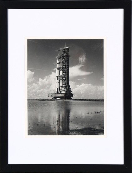 An original NASA black-and-white photograph of a Saturn V rocket ready for launching. Ca. 1973.