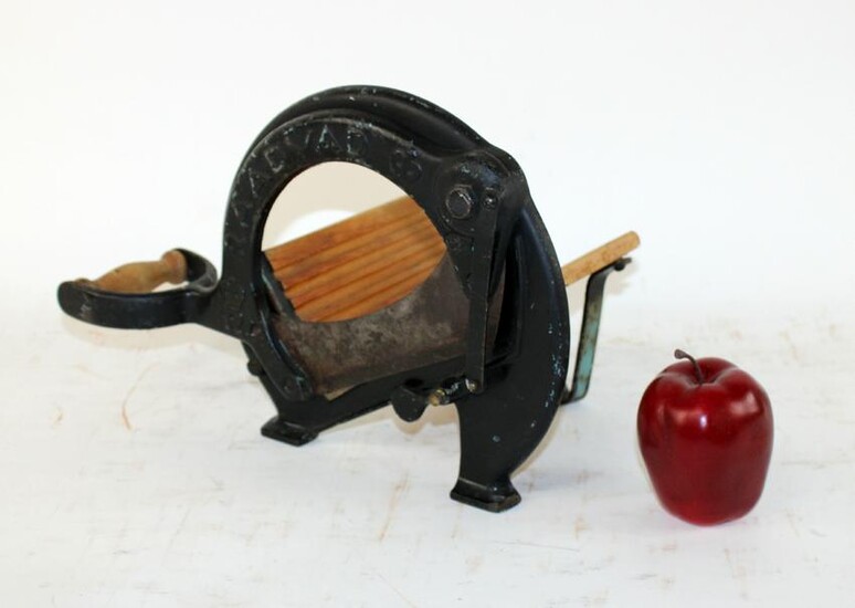 Antique French iron and wood bread slicer
