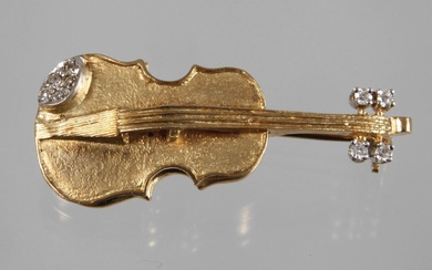 Broche violon avec diamants vers 1980, or blanc et jaune estampillé 585, en forme de...