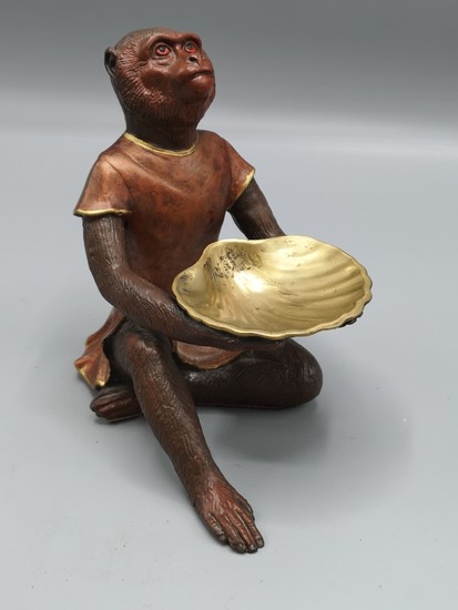 Bronze monkey figure . Stands 5.5 inches