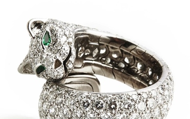 Cartier: A Panthère “Lakarda” emerald and diamond ring set with two pear-shaped emeralds and brilliant-cut diamonds, mounted in 18k white gold. Case incl.