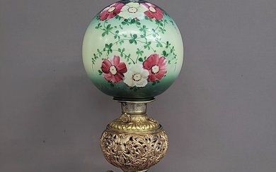Circa 1890's Putti Oil Banquet Lamp with nice 10" antique floral ball shade. Very good restored