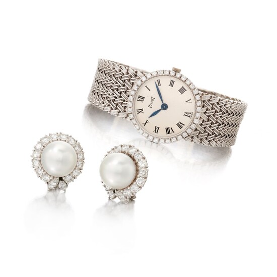 Cultured pearl and diamond earclips and a lady's diamond wristwatch signed Piaget (Paio di orecchini a clip con perle coltivate e diamanti e un orologio firmato Piaget, Piaget