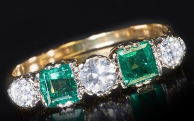 EMERALD AND DIAMOND FIVE STONE RING. High carat gold. Set wi...