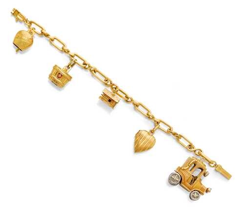 GOLD CHARMS BRACELET AND 2 PENDANTS.