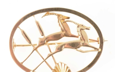 Geoffrey Bellamy for Ivan Tarratt a 9 carat yellow gold leaping gazelle brooch.