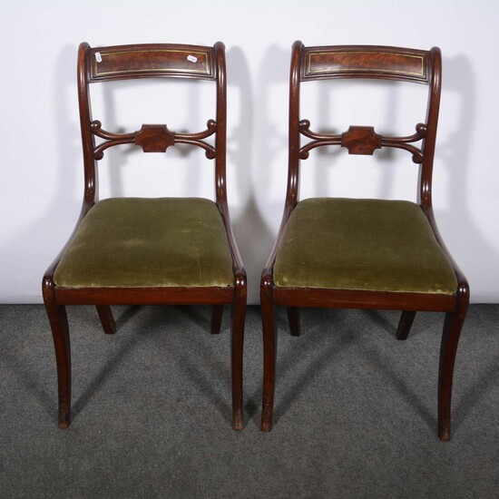 George III mahogany dining table and a set of eight dining chairs