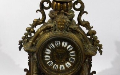 HANGING in gilt bronze with round dial with black enamelled...