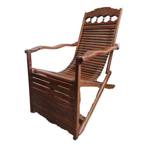 INDIAN HARDWOOD LOLLING CHAIR 20TH CENTURY with slatted seat...