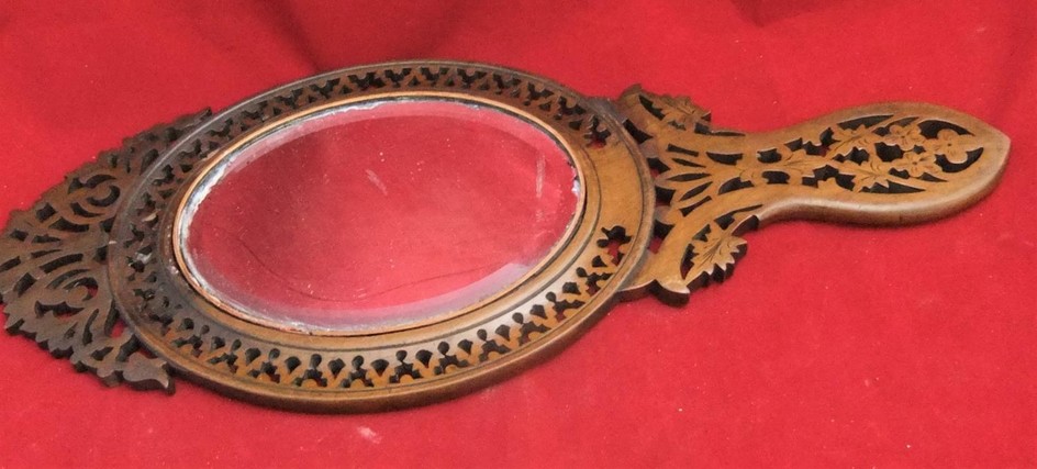 Italian 19thC Sorrento mirror, 42 cms in length. P&P - UK £...
