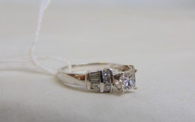 Jewelry. Diamond 14kt white gold engagement ring, princess cut center stone approx. 5mm; size 7;