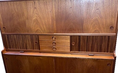 SOLD. Johannes Andersen: A teak sideboard, front with drawers, doors and two pull-out trays. Manufactured by Skaaning Furniture. – Bruun Rasmussen Auctioneers of Fine Art