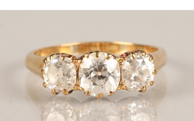 Ladies three stone graduated diamond ring, mounted on yellow...