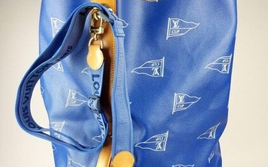 Louis VUITTON - BAG in blue coated canvas and light brown leather with white pennants and monograms, 1992 limited edition for the Louis Vuitton Cup entitled "For the America's Cup", bag number 00912. 53 x 55 x 40 cm